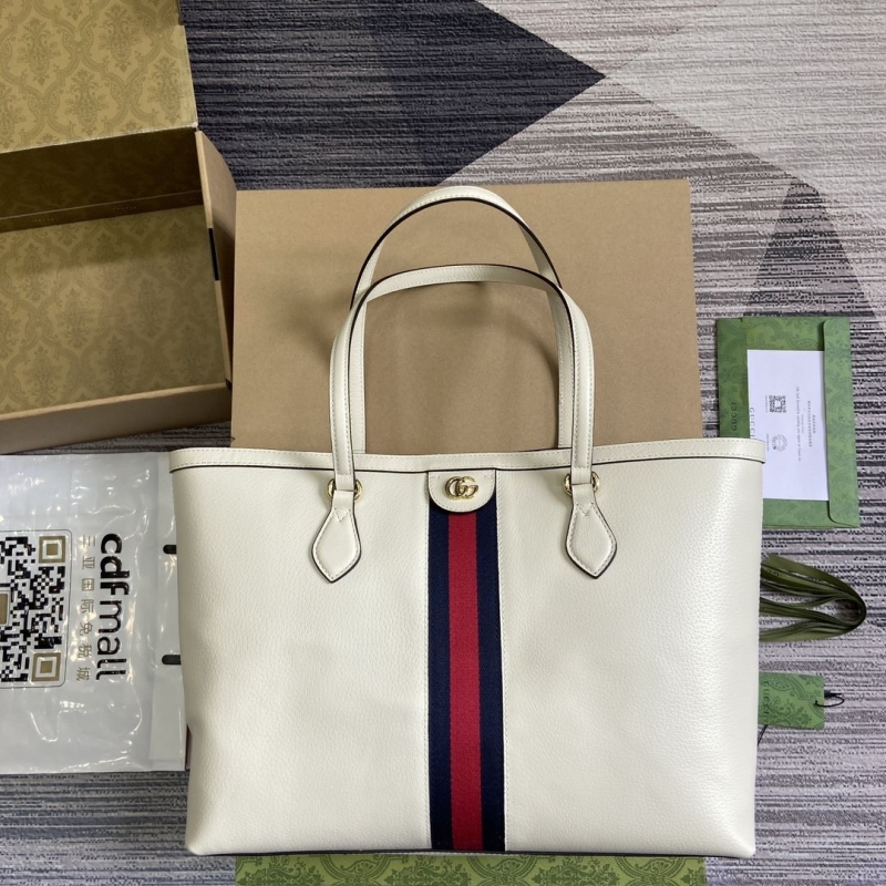 G*u*i shopping bags